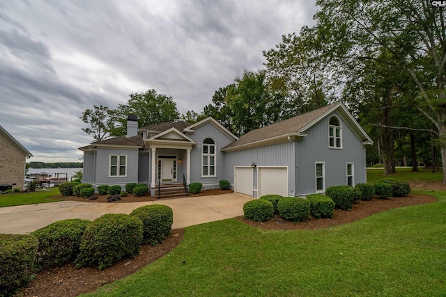 single story home with a garage and a front lawn