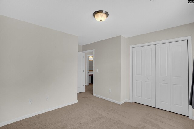25 Eason Ct, Columbia, SC 29209 - unfurnished bedroom featuring carpet floors, baseboards, and a closet