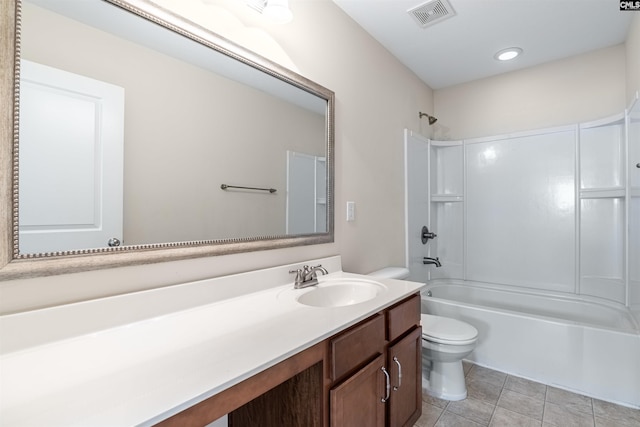 full bathroom with shower / bathing tub combination, tile patterned floors, vanity, and toilet