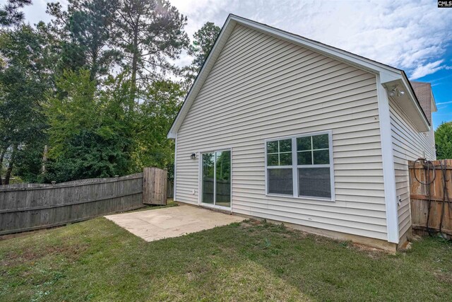 25 Eason Ct, Columbia, SC 29209 - rear view of property featuring a yard, a patio, and fence