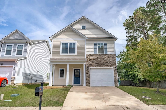 view of front of home featuring a front lawn and a garage