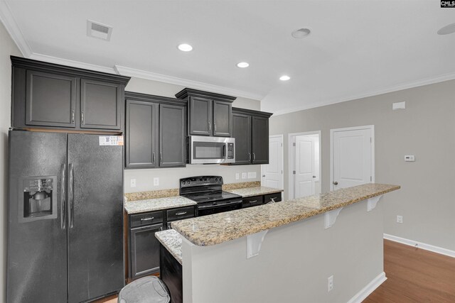 25 Eason Ct, Columbia, SC 29209 - kitchen featuring a kitchen island with sink, visible vents, ornamental molding, and black appliances