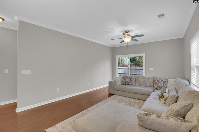 living room with ceiling fan, hardwood / wood-style flooring, and crown molding