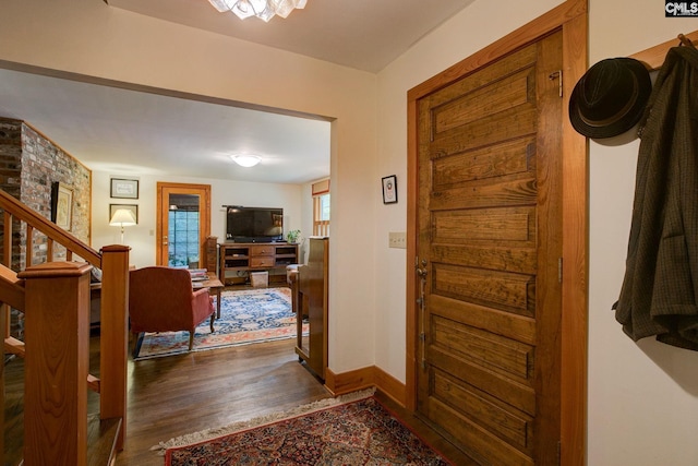 entryway featuring dark wood-type flooring