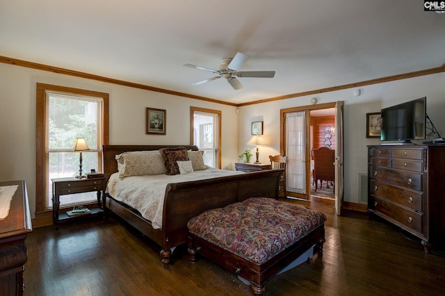 bedroom with ceiling fan, crown molding, dark hardwood / wood-style floors, and multiple windows