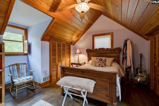 bedroom with vaulted ceiling, ceiling fan, wooden ceiling, and dark wood-type flooring