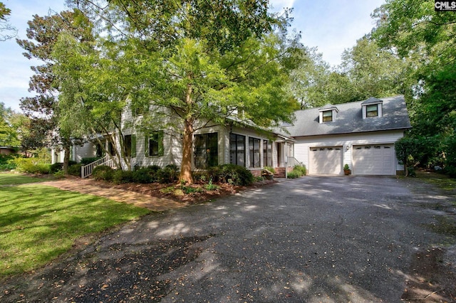 view of front of home with a front lawn