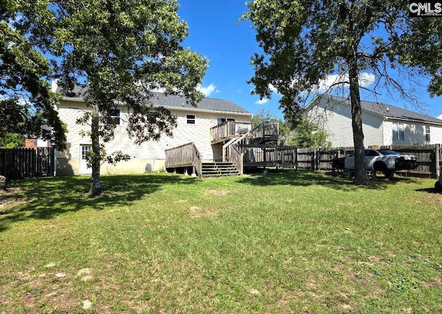 view of yard featuring a deck