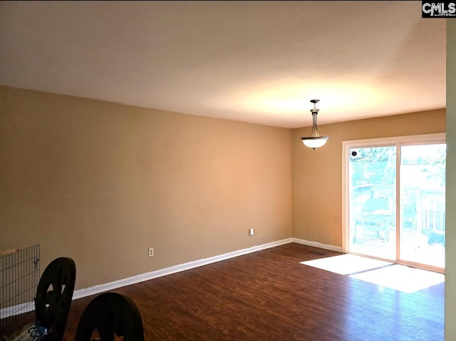 interior space with dark hardwood / wood-style flooring