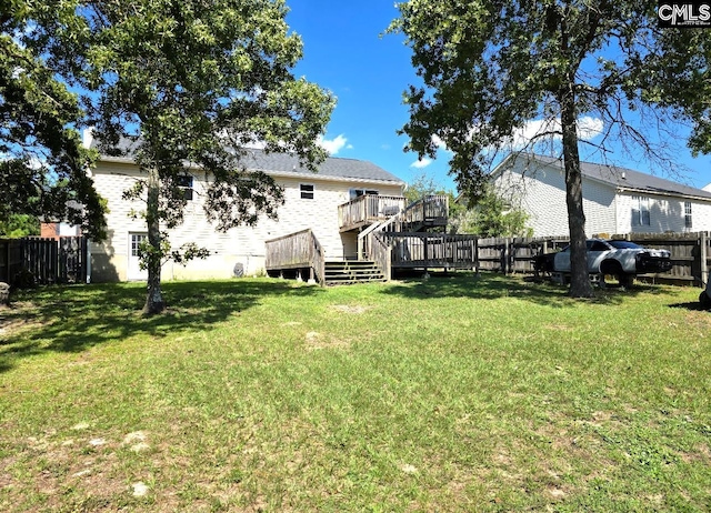 view of yard featuring a deck