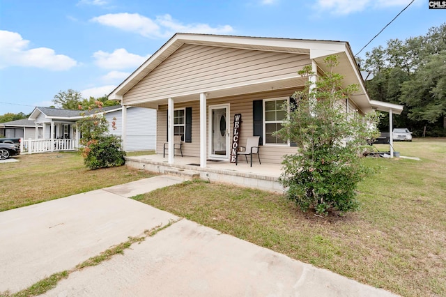 view of front of property with a front lawn and a porch