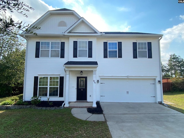 view of front facade with a front lawn and a garage