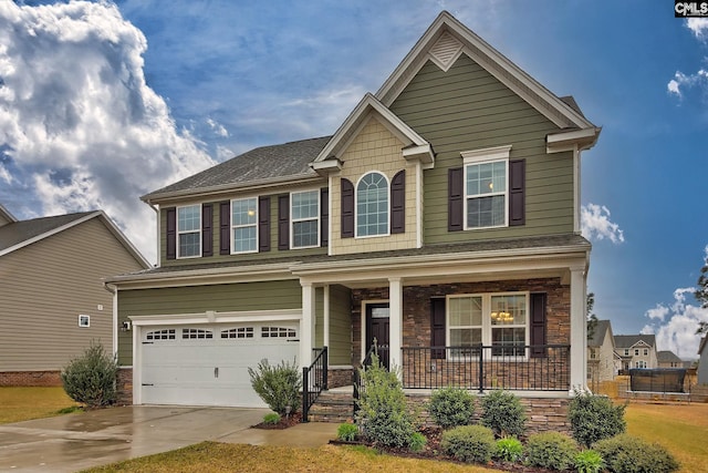 craftsman house featuring a garage and covered porch