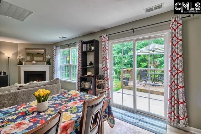 dining room featuring plenty of natural light