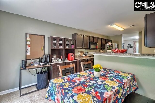 view of tiled dining area