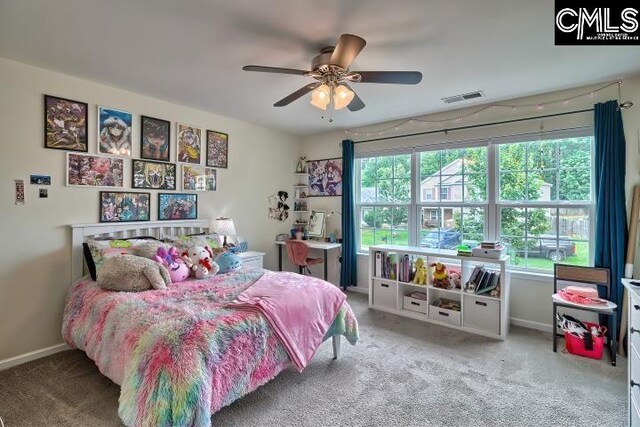 carpeted bedroom with ceiling fan