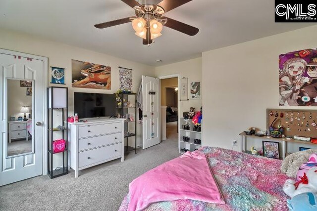 carpeted bedroom featuring ceiling fan