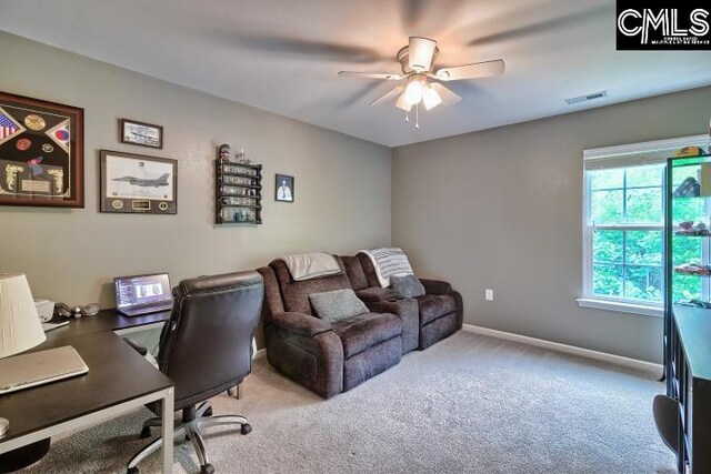 office with ceiling fan and light carpet