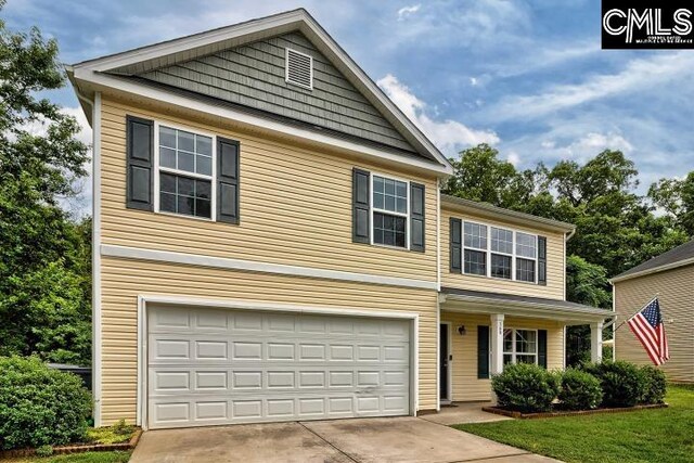 view of property featuring a garage