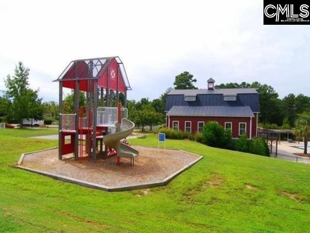 view of play area featuring a lawn