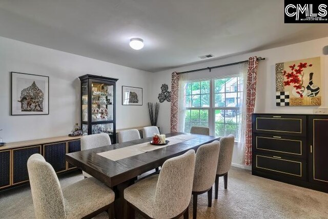 view of carpeted dining room