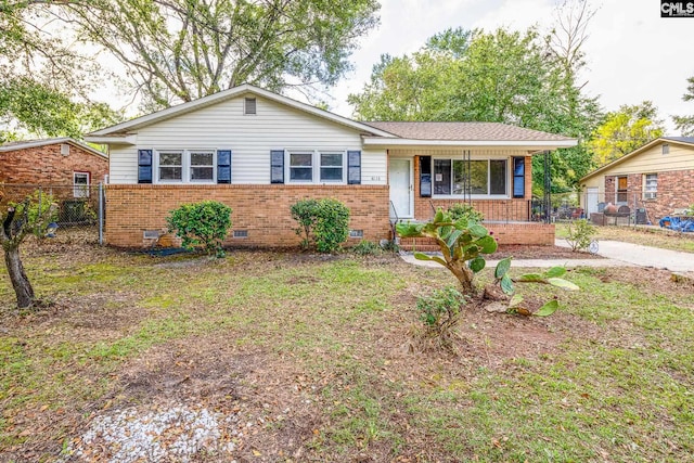 ranch-style home featuring covered porch