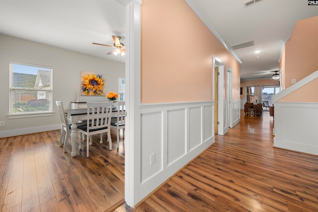 hallway with wood-type flooring