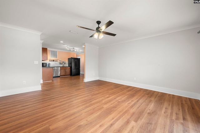 unfurnished living room featuring crown molding, ceiling fan, and light hardwood / wood-style floors