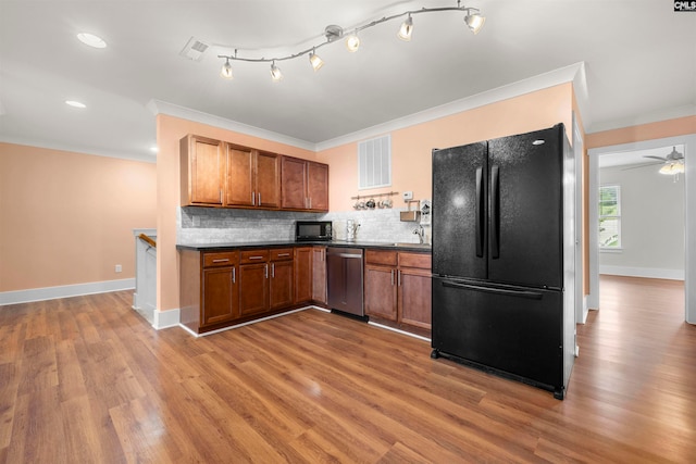 kitchen with black appliances, ceiling fan, tasteful backsplash, light hardwood / wood-style floors, and crown molding