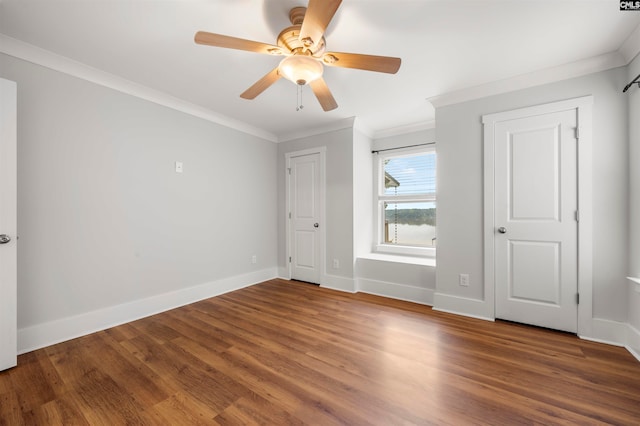 unfurnished bedroom featuring ornamental molding, hardwood / wood-style floors, and ceiling fan