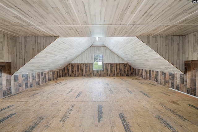 bonus room with lofted ceiling and wood ceiling