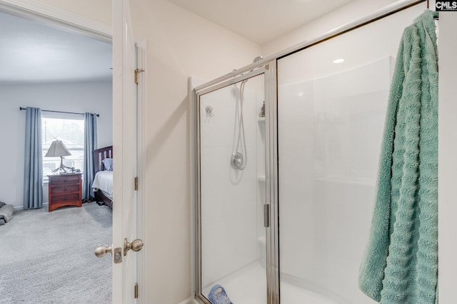 bathroom featuring vaulted ceiling and a shower with door