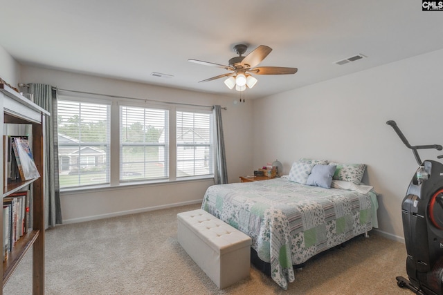 carpeted bedroom featuring ceiling fan