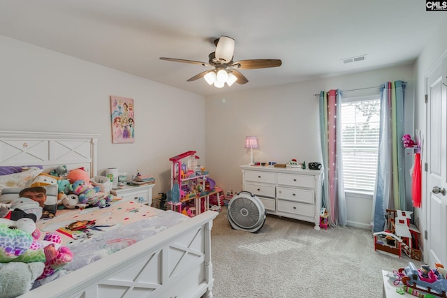 carpeted bedroom with ceiling fan