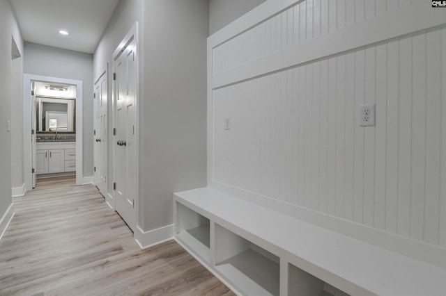 mudroom with light wood-type flooring