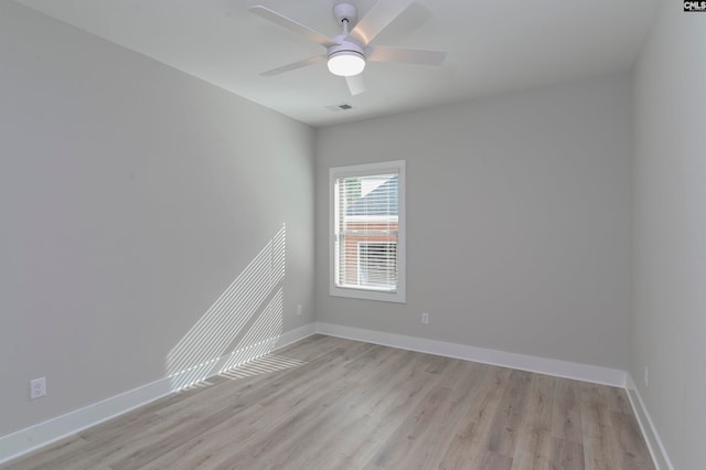 unfurnished room featuring ceiling fan and light hardwood / wood-style flooring