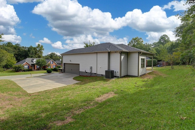 view of home's exterior featuring cooling unit and a yard