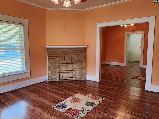 unfurnished living room featuring ornamental molding, dark hardwood / wood-style flooring, and ceiling fan