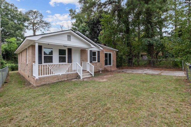 bungalow with a front lawn