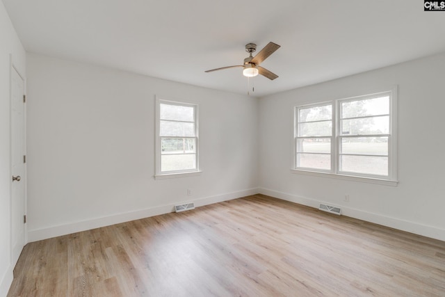 unfurnished room with ceiling fan and light hardwood / wood-style flooring