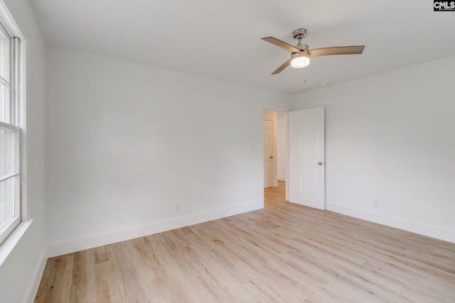 unfurnished room with ceiling fan and light hardwood / wood-style floors