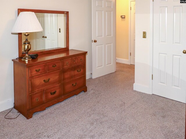 bedroom with light carpet