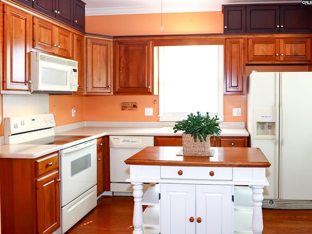 kitchen with ornamental molding, white appliances, and dark hardwood / wood-style floors