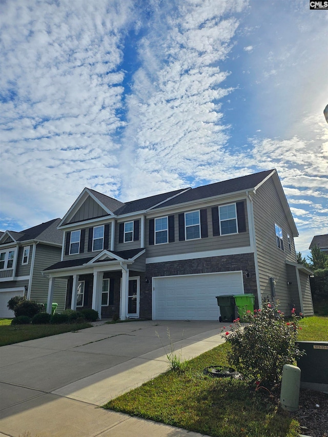 view of front of home with a garage