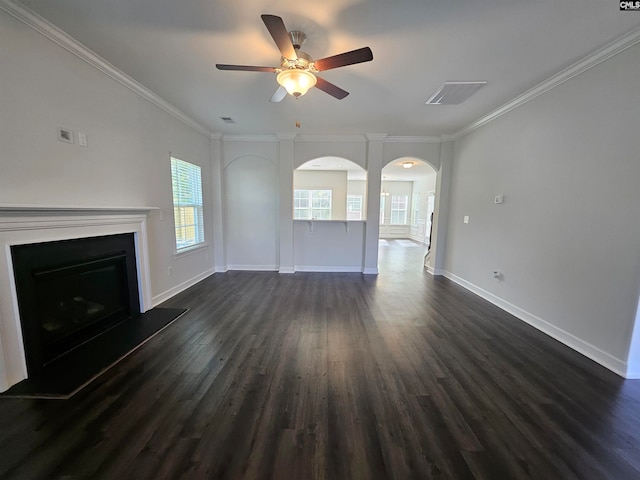 unfurnished living room with dark hardwood / wood-style flooring, ceiling fan, and crown molding