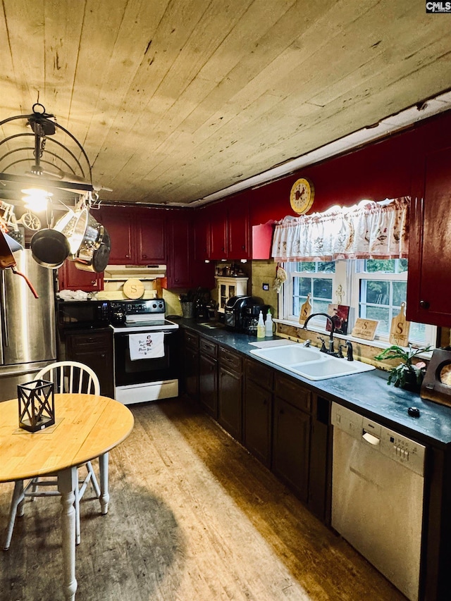 kitchen featuring light hardwood / wood-style flooring, wood ceiling, white appliances, and sink