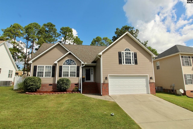 view of front of home with central AC, a garage, concrete driveway, and a front lawn