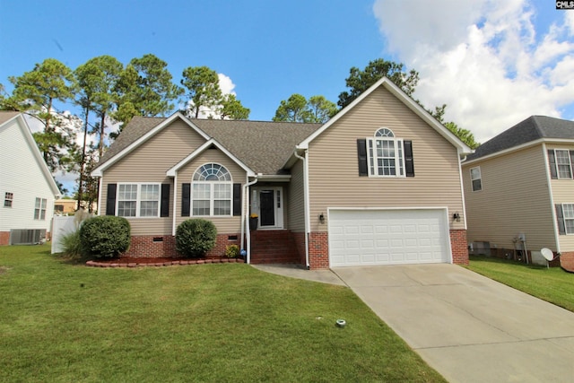 view of front of house featuring an attached garage, central air condition unit, a front yard, driveway, and crawl space