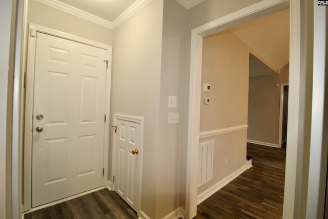 hallway featuring crown molding and dark hardwood / wood-style flooring