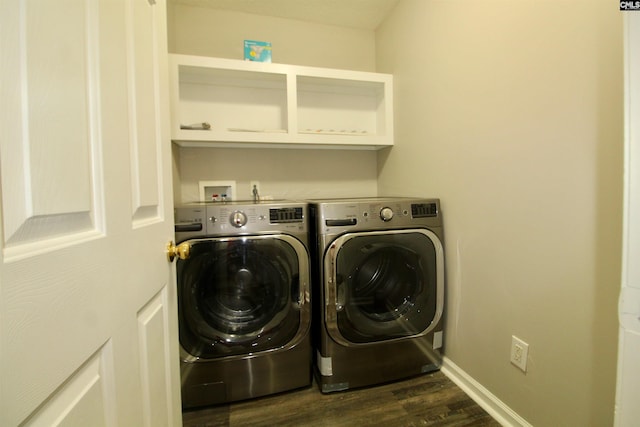 laundry room featuring separate washer and dryer, dark wood finished floors, and baseboards